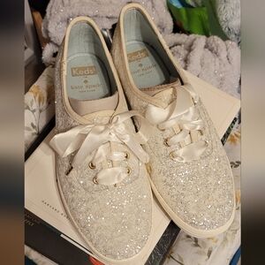 kate spade New York Women’s Cream Glitter Lace-Up Sneakers